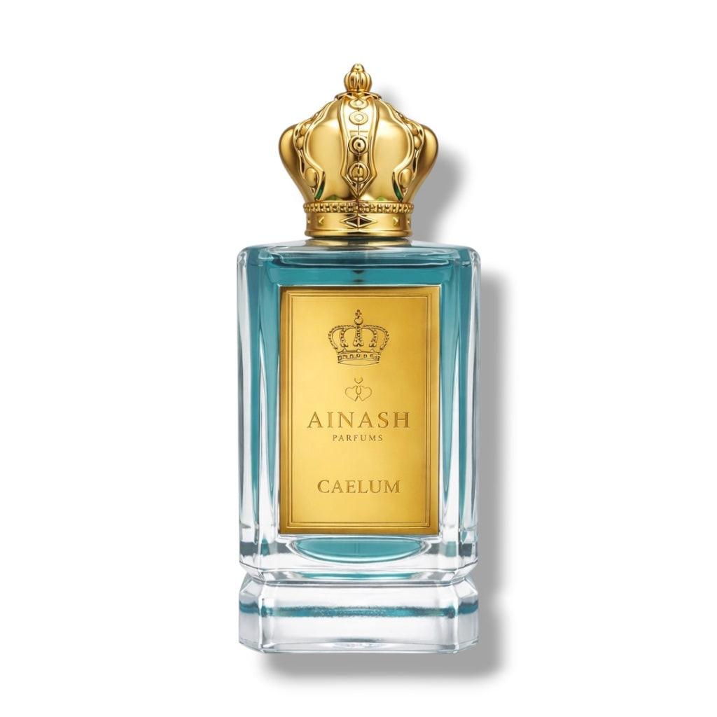 fresh citrus perfume bottle Caelum Ainash Parfums tropical mango pineapple fragrance luxury scent